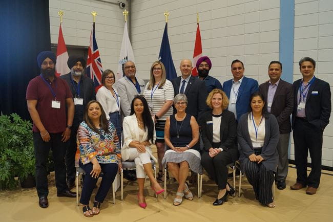 Group photo of Sheridan administration, community and government partners