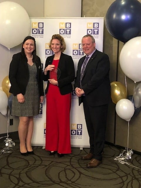 Dr. Janet Morrison, President and Vice Chancellor of Sheridan, poses with the MBOT Award for Employer of the year. Amy Delisle, Vice Chair of the Board of Directors at MBOT stands to her left, while Trevor McPherson, President and CEO of MBOT, stands to her right. 