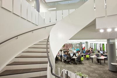 students sit in the learning commons