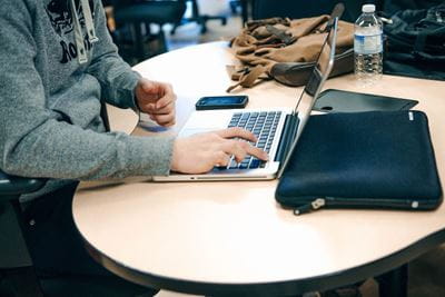 student at laptop