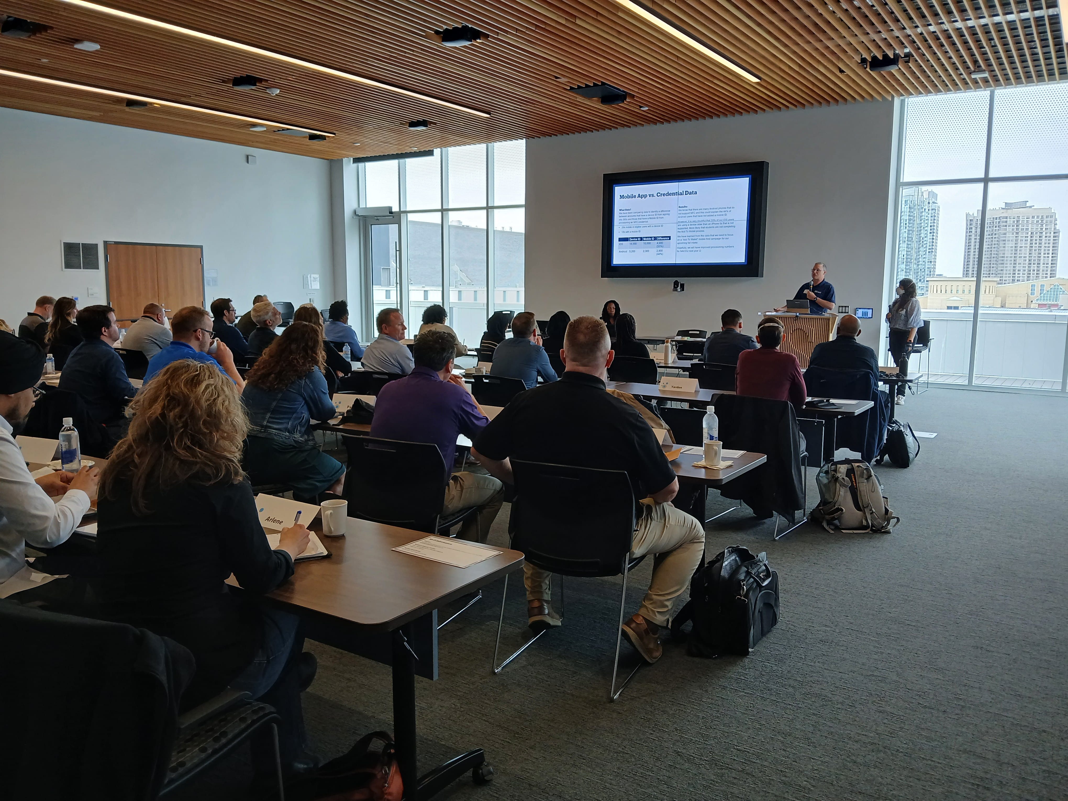 Participants sit in a classroom during a workshop about Sheridan's mobile onecard