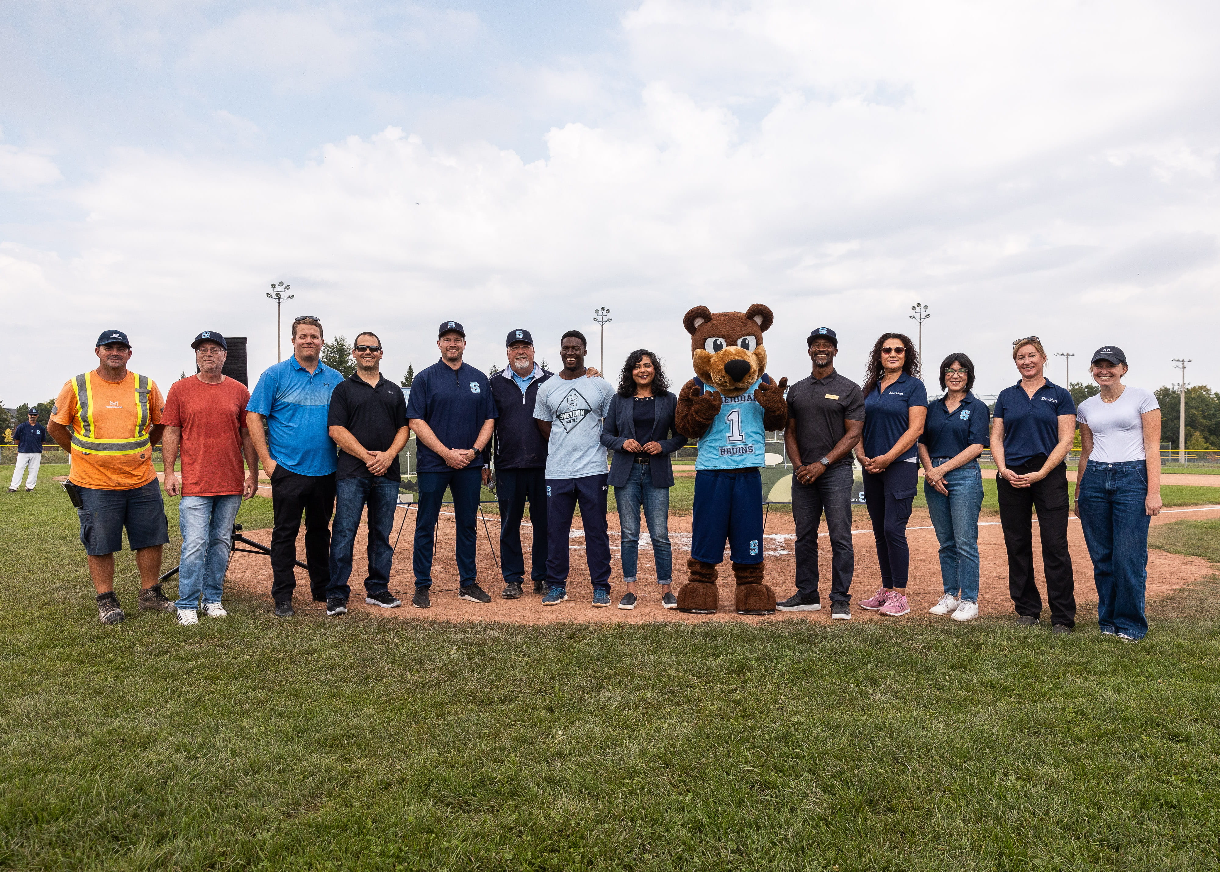 Members of the Sheridan community and City of Mississauga pose for a group photo at Quenippenon Park