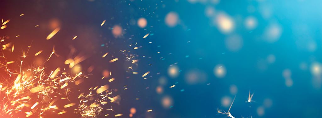 Sparks fly in the air as something is welded