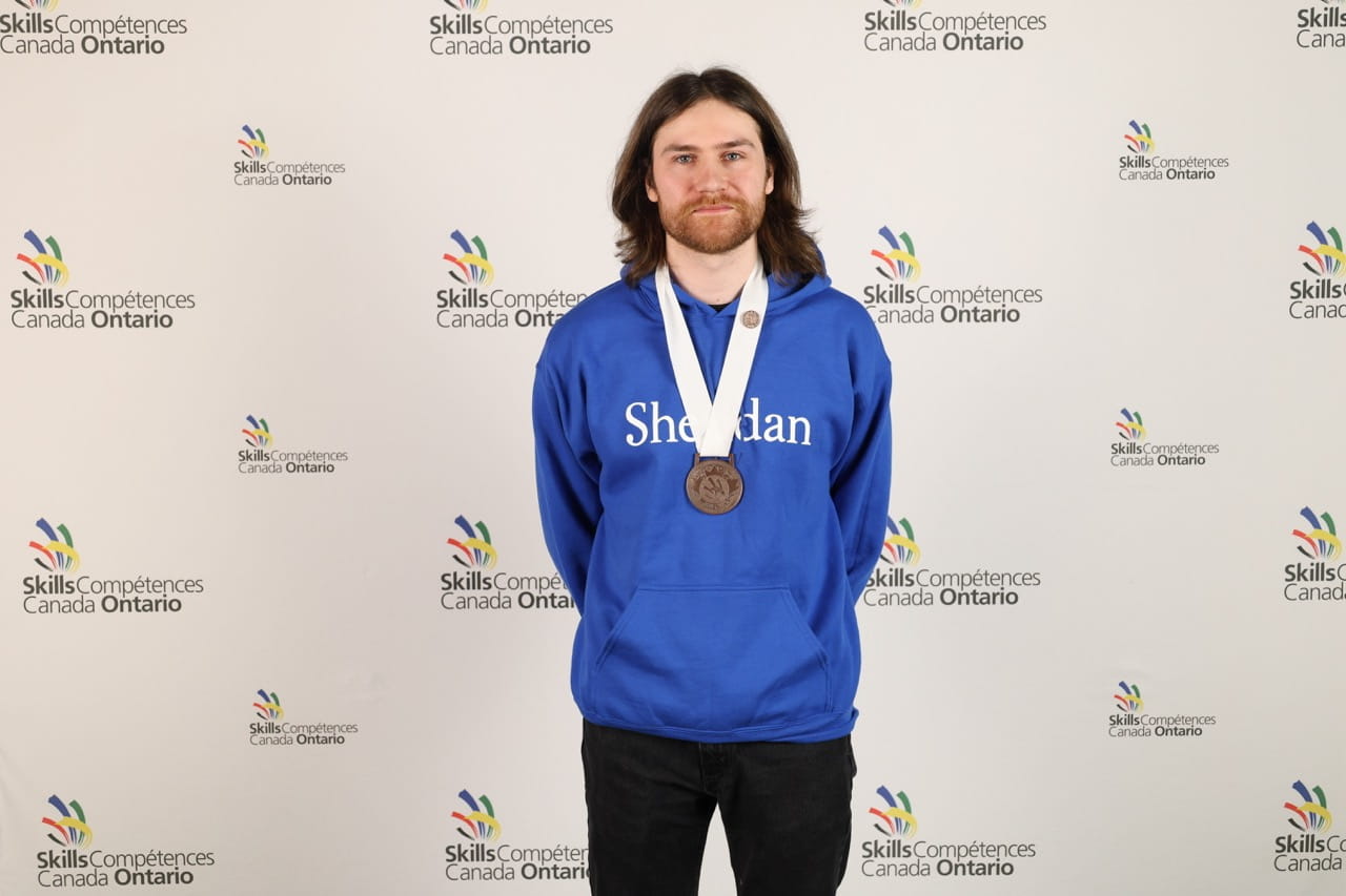 Christian Hills is pictured wearing his Skills Ontario Competition bronze medal