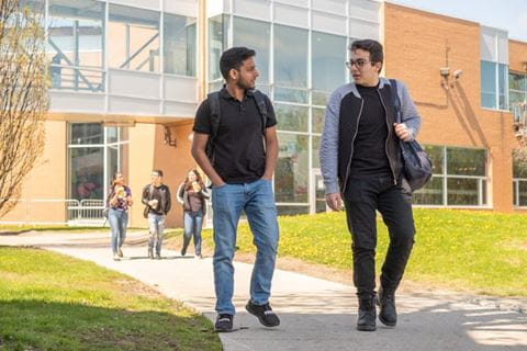 students walking on campus