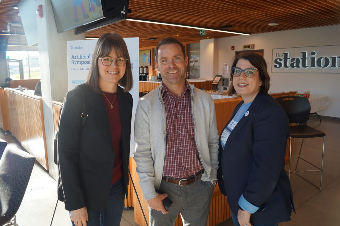 Andrea England, Jock Phippen and Deanna McQuarrie smile at the camera