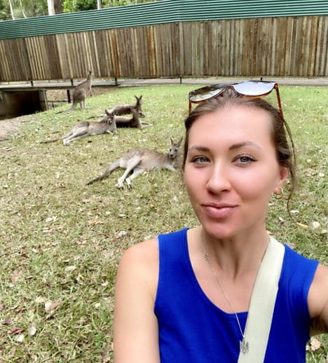 Alexandra Lishchyna with kangaroos in the background
