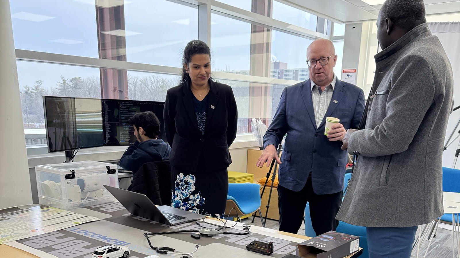 Three people having a discussion