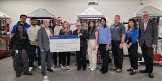 David Shnider, director of the Princess Auto Foundation, and the donation cheque.