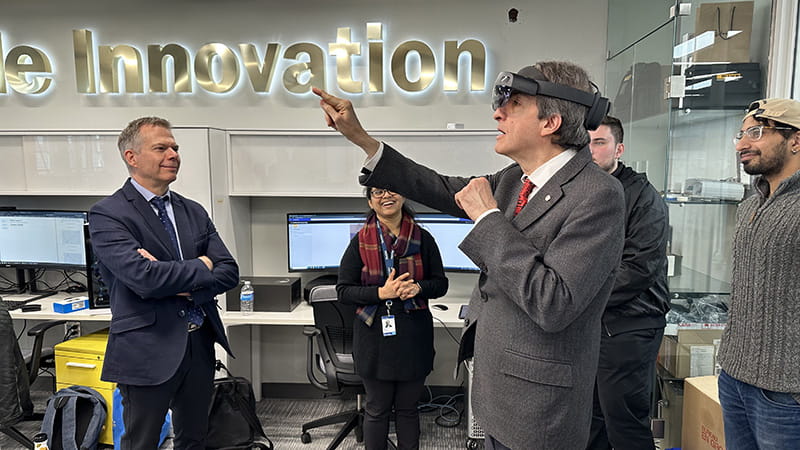 Person interacting with a virtual reality (VR) headset