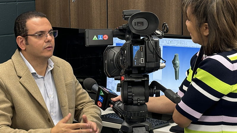 Person being interviewed on camera