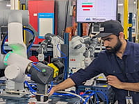 Person working in a robotics lab