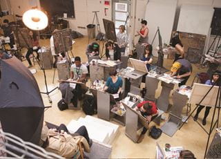 Illustration students working in a studio