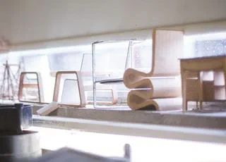 furniture student using a lathe