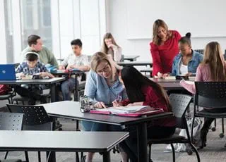 Students working in pairs in a classroom