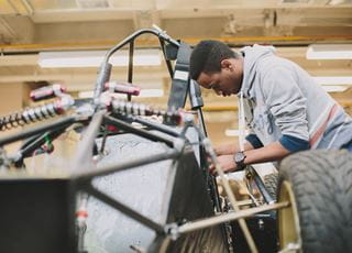 A student building a race car