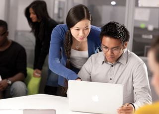 Students working on a laptop