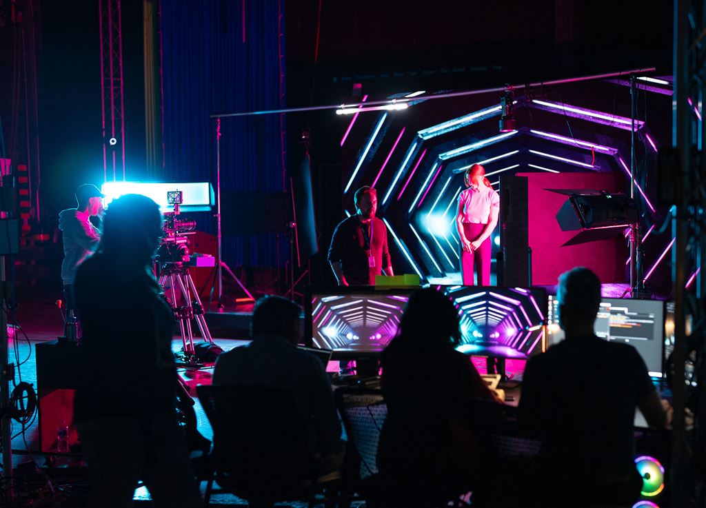 Students working in a virtual production studio