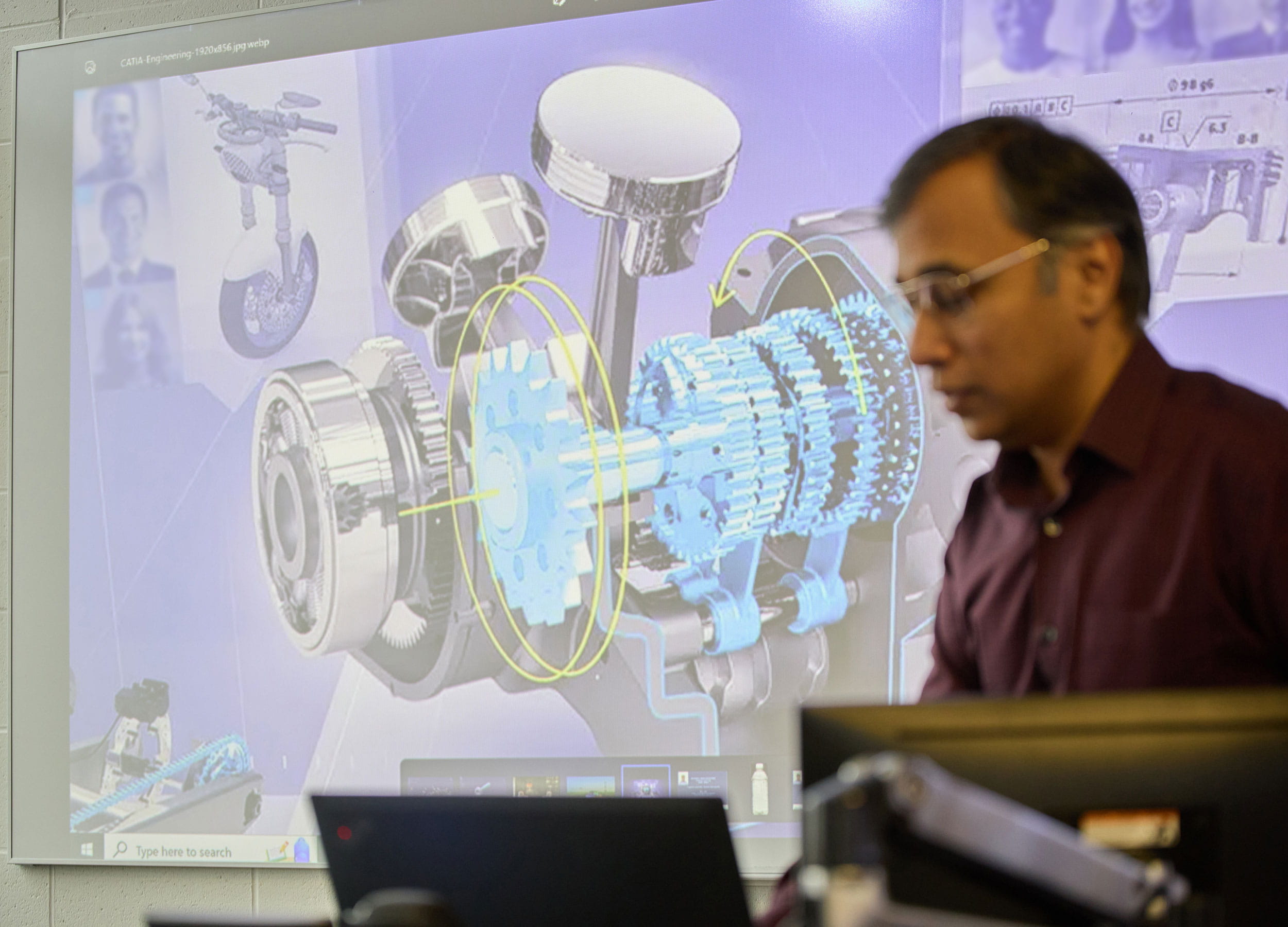Design & drafting mechanical engineering student working in a lab
