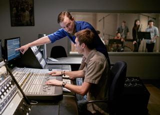 Students working on a sound board