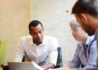 Project managers in a meeting room