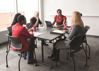 Social Service workers in a meeting room